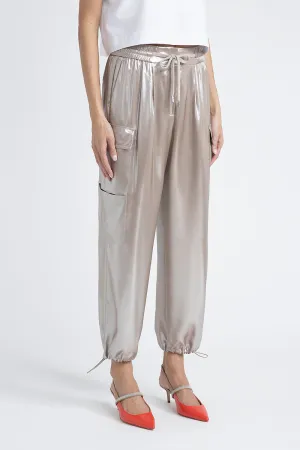 Baggy trousers in flowing silver laminated viscose twill